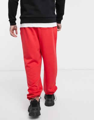 red oversized joggers