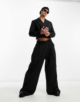 ASOS DESIGN super oversized suit cargo trousers with pockets in black