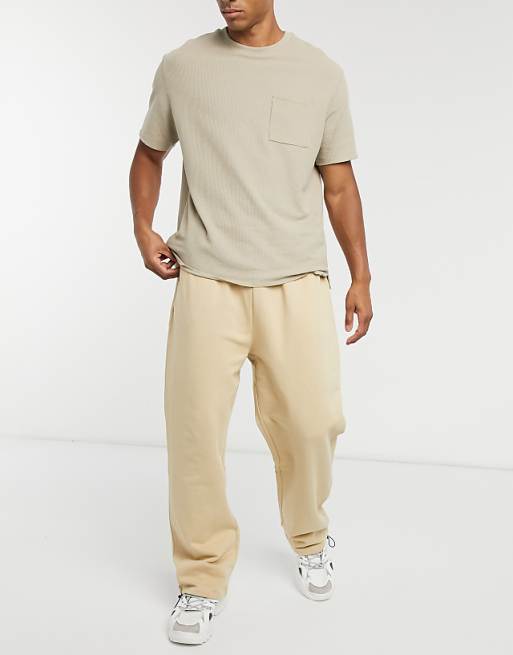 ASOS DESIGN super oversized sweatpants in beige with toggle hem | ASOS