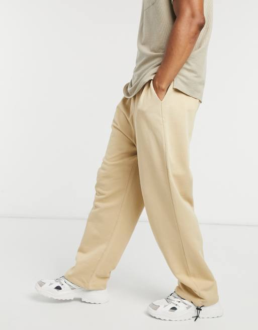 ASOS DESIGN super oversized sweatpants in beige with toggle hem