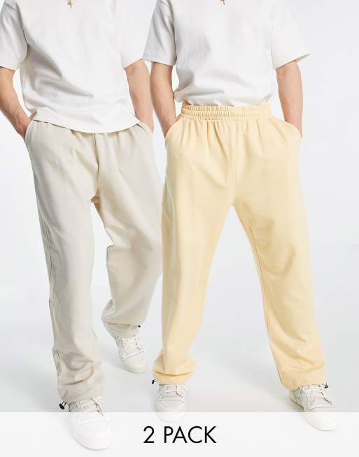 ASOS DESIGN super oversized sweatpants with toggle hem in oatmeal heather/pastel orange 2 pack - MULTI