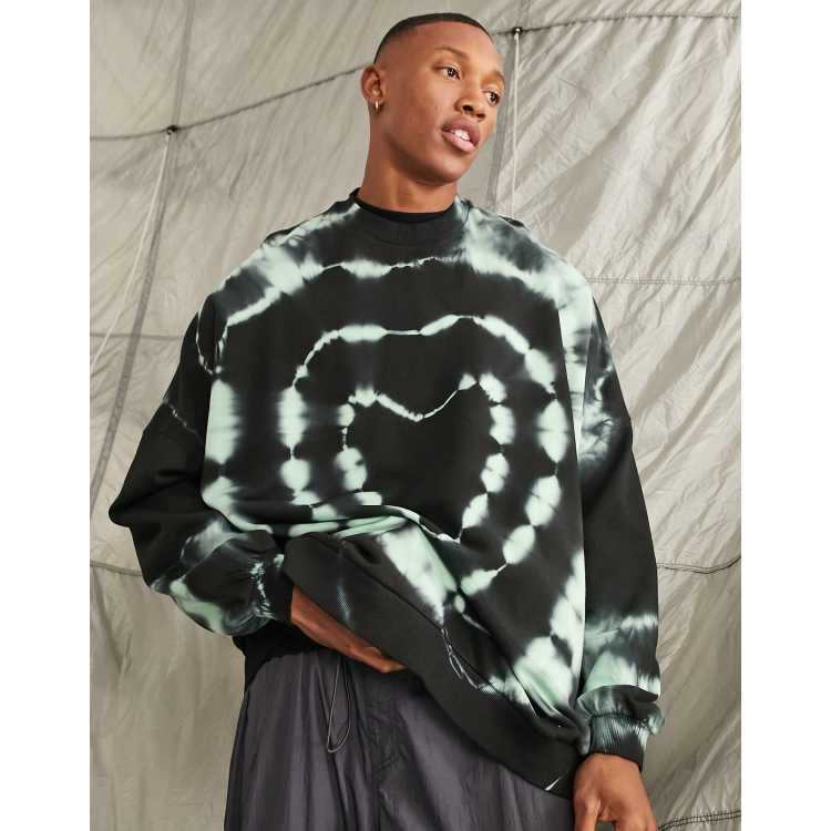 ASOS DESIGN super oversized sweatshirt in black with green heart tie dye |  ASOS