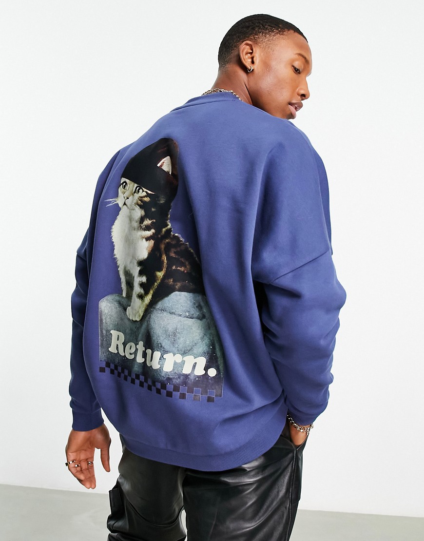 ASOS DESIGN super oversized sweatshirt in blue with photographic skate back print and text front pri