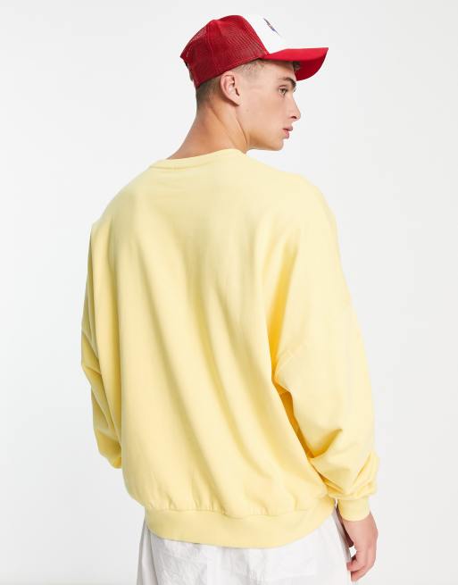 ASOS DESIGN super oversized sweatshirt in yellow