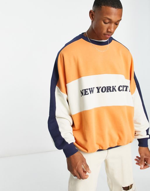 ASOS Design Oversized Hockey Jersey with City Print in Black and Orange