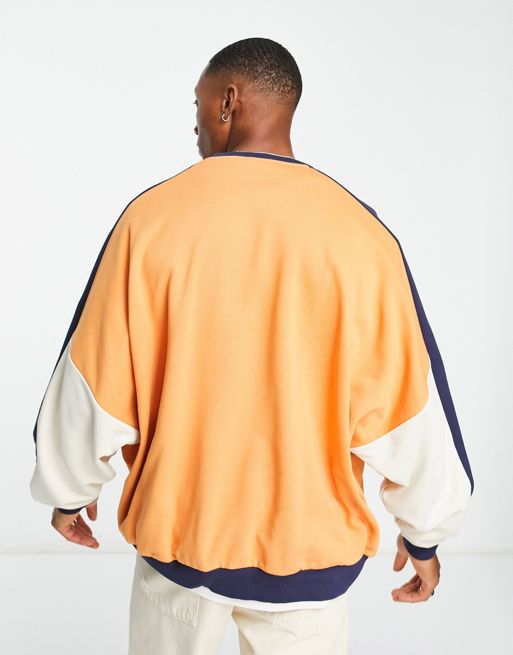 ASOS Design Oversized Hockey Jersey with City Print in Black and Orange