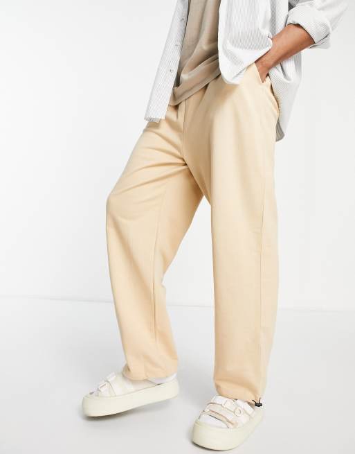 ASOS DESIGN super oversized trackies in beige with toggle hem - BEIGE