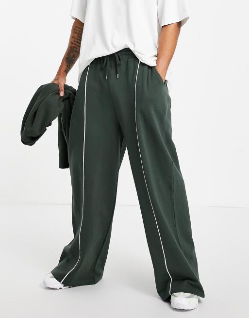 ASOS DESIGN super oversized wide leg joggers with piping in green