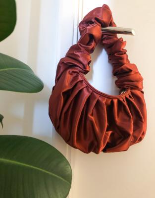 rust clutch bag