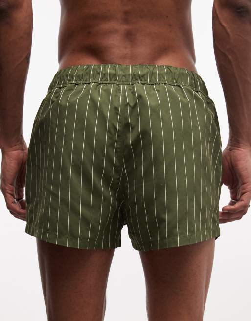 ASOS DESIGN super short length swim shorts in khaki-green and white pinstripes, 4 of 5