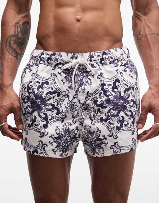 ASOS DESIGN super short length swim shorts in white dragon print, 4 of 5