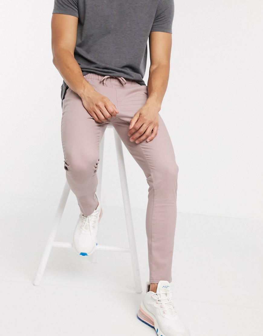 ASOS DESIGN super skinny chinos with elastic waist in warm pink