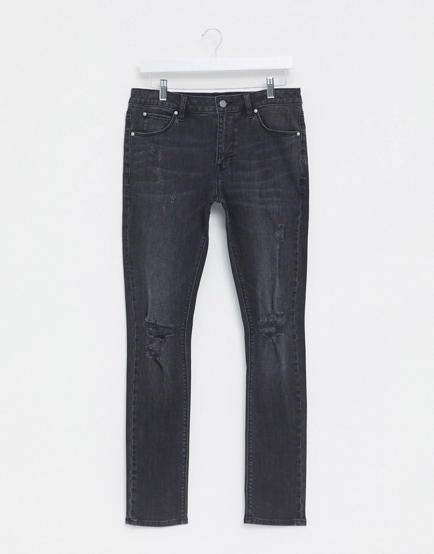 ASOS DESIGN super skinny denim jeans in washed black with rips