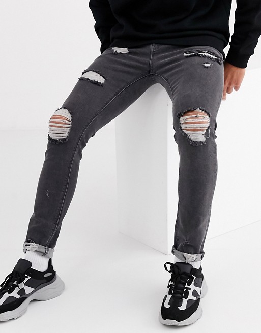 ASOS DESIGN super skinny jeans in vintage grey with heavy rips
