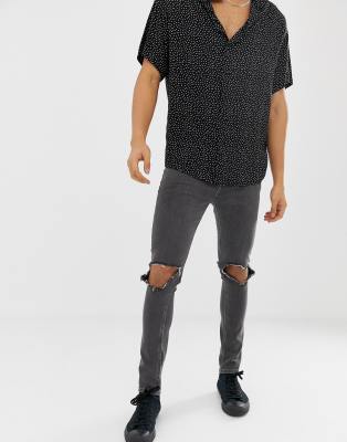 open knee black jeans