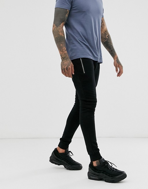 ASOS DESIGN super skinny joggers in black with silver zip pockets