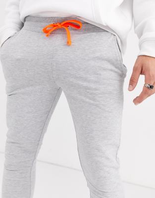 grey and orange joggers