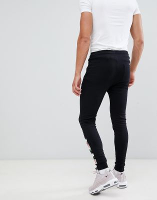 ASOS DESIGN skinny joggers with rose gold ankle zip and pockets