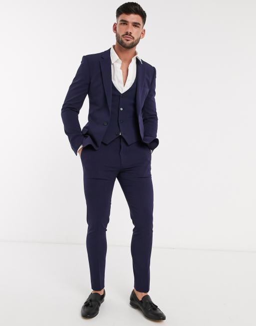 ASOS DESIGN super skinny suit jacket in four way stretch in navy