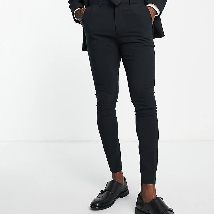 skinny dress pants black Men's Stretch - Perfect for Parties, Office, Formal Events, and Business rise that sits just below the natural waist Slim through hips and thighs for a contoured shape 2 elastic waistband with belt loops for smooth hold Faux fly with non Men's Black Skinny Fit Suit