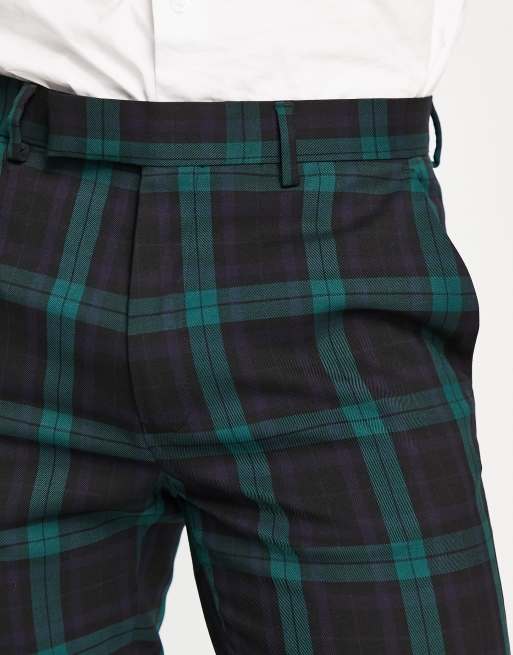 Dark green tartan store trousers