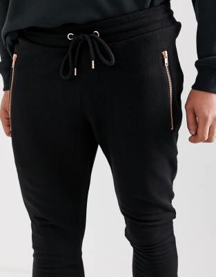 ASOS DESIGN skinny joggers with rose gold ankle zip and pockets