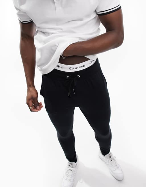 ASOS DESIGN super skinny trackies in black