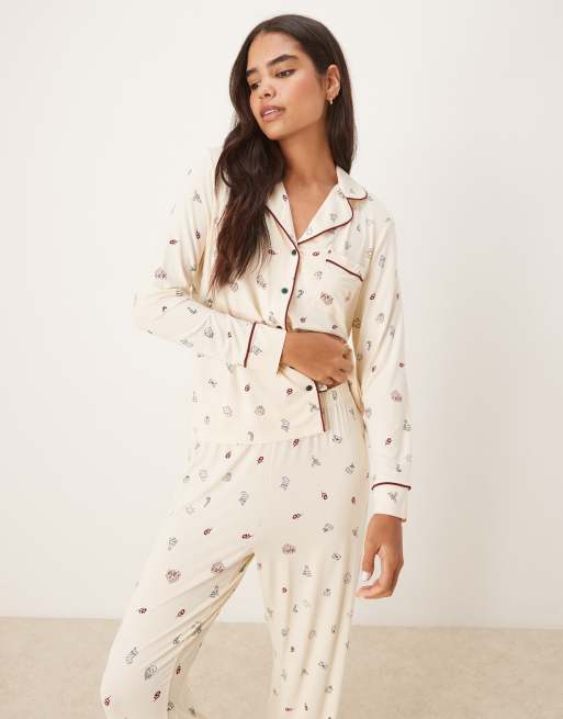 ASOS DESIGN super soft long sleeve shirt & pants pajama set with contrast piping in cream Christmas print