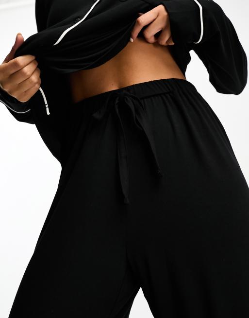 ASOS DESIGN super soft long sleeve shirt & trouser pyjama set with contrast piping in black, 3 of 4
