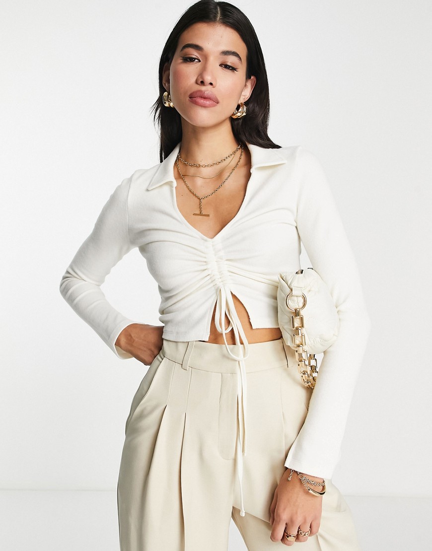 ASOS DESIGN super soft ribbed ruched front polo in winter white