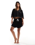 [ASOS DESIGN] ASOS DESIGN super soft slinky mini pyjama short in black with contrast binding S Black