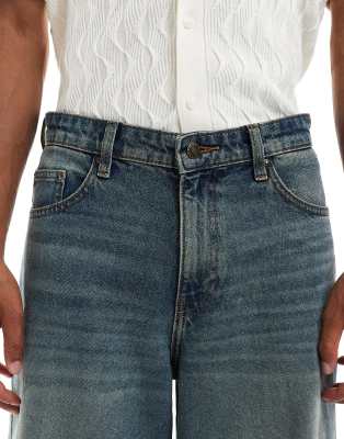 ASOS DESIGN super wide leg jeans in dark wash blue | ASOS