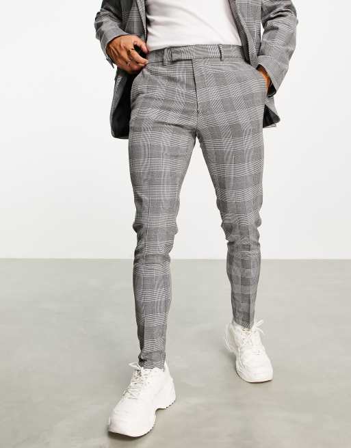 ASOS DESIGN – Supereng geschnittene Anzughose mit Prince of Wales-Karomuster in Schwarz