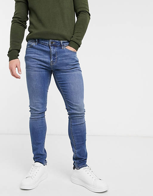 ASOS DESIGN – Superenge Jeans in mittelblauer Waschung