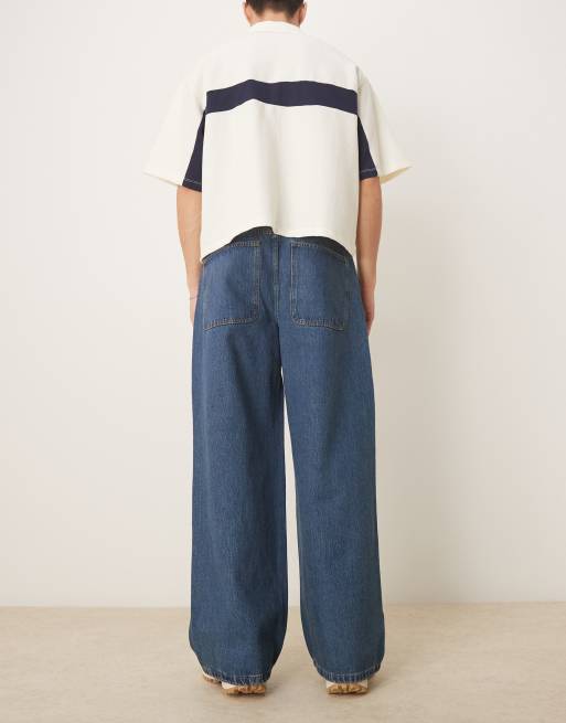 ASOS DESIGN - Superposede jeans med snoede sømme i blå mellemvask, 2 af 5
