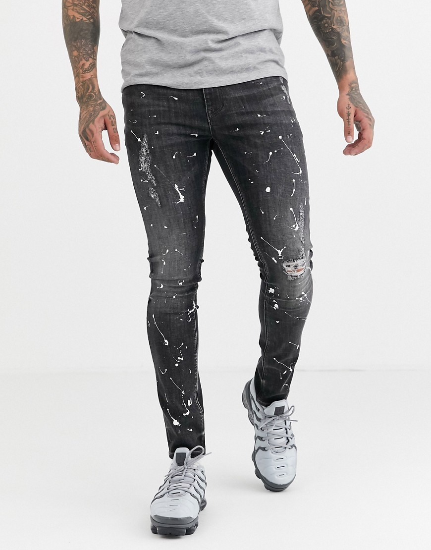 ASOS DESIGN - superskinny jeans i sort vask med malingpletter