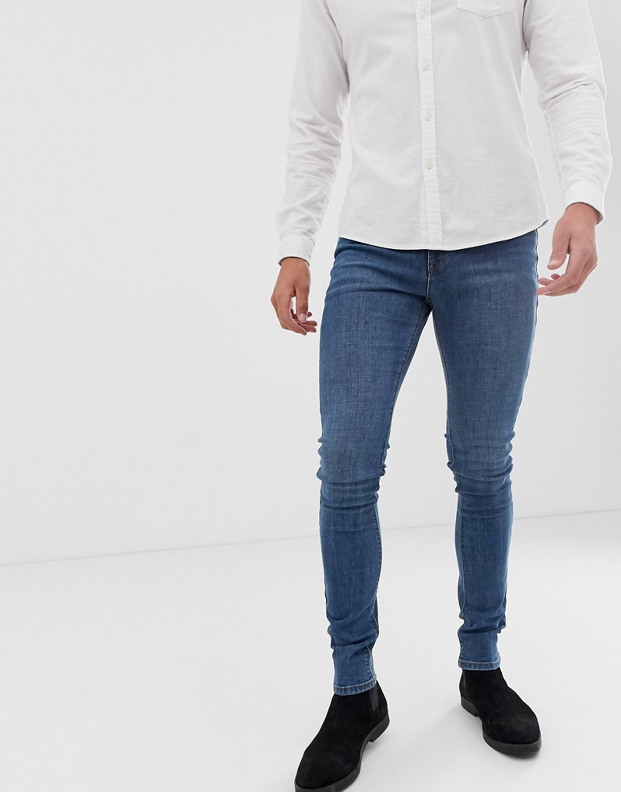 ASOS DESIGN - Superskinny jeans in middenblauw