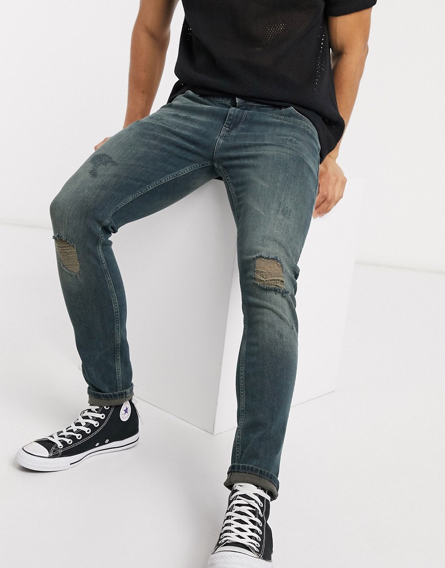 ASOS DESIGN - Superskinny jeans met kniescheuren in vintage greencast-Blauw
