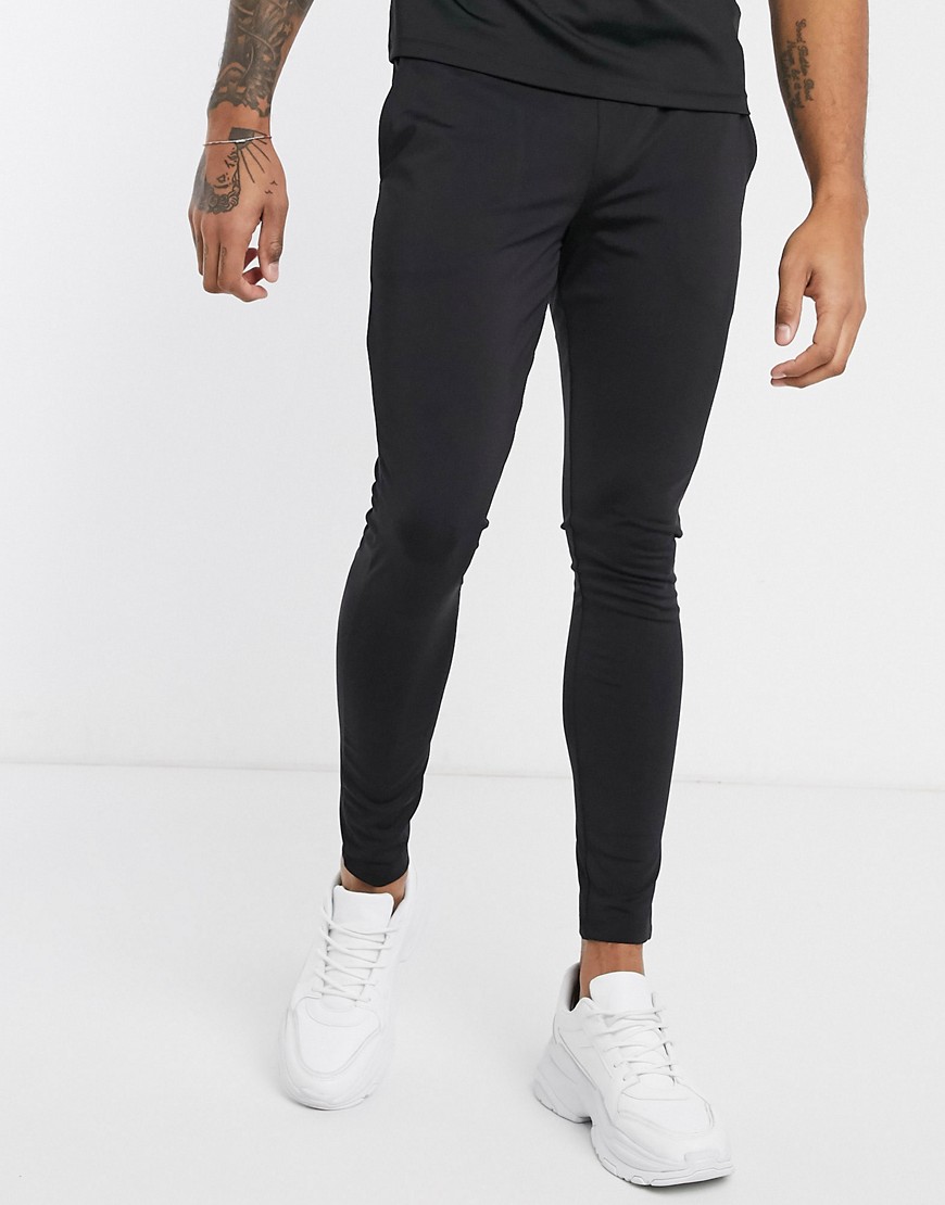 ASOS DESIGN - Superskinny joggingbroek combi-set van samengestelde tricot met vaste zoom-Zwart