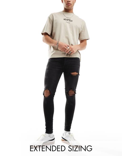 ASOS DESIGN - Superstrakke spray-on jeans met powerstretch en scheuren in zwart met wassing