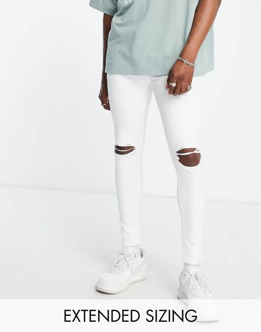 ASOS DESIGN - Superstrakke spray-on jeans met powerstretch en scheuren op de knieën in wit 
