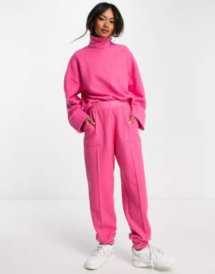 ASOS DESIGN - Superweiche Jogginghose in leuchtendem Rosa mit Ziernähten, Kombiteil