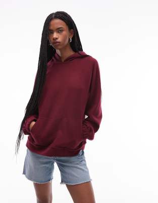 ASOS DESIGN - Superweicher Oversize-Kapuzenpullover in dunklem Kirschrot mit Raglanärmeln