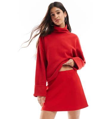 ASOS DESIGN - Superweicher Rollkragenpullover in Rot mit Bündchen