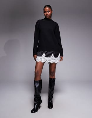 ASOS DESIGN - Superweiches Minikleid in Schwarz mit Trichterkragen und Kontrast-Spitzensaum