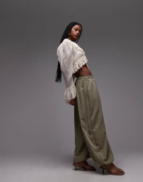 ASOS DESIGN – Superweit geschnittene Hose in Pistaziengrün mit Bindegürtel - view 1