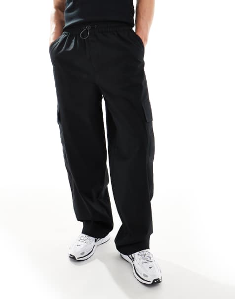 ASOS DESIGN – Superweite Cargo-Schlupfhose in Schwarz - view 1