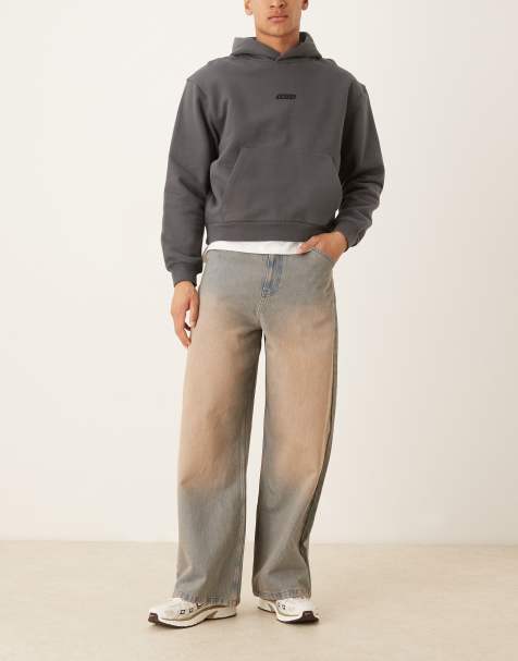 ASOS DESIGN – Superweite Jeans in mittelblauer Waschung mit starkem rotem Farbstich - view 1
