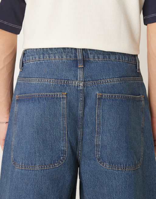 ASOS DESIGN – Superweite Jeans in mittelblauer Waschung mit verdrehten Nähten, 4 von 5