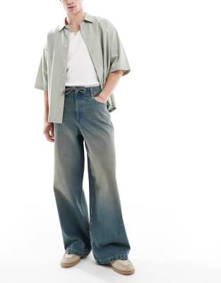 ASOS DESIGN – Superweite Jeans in mittelblauer Waschung - view 1